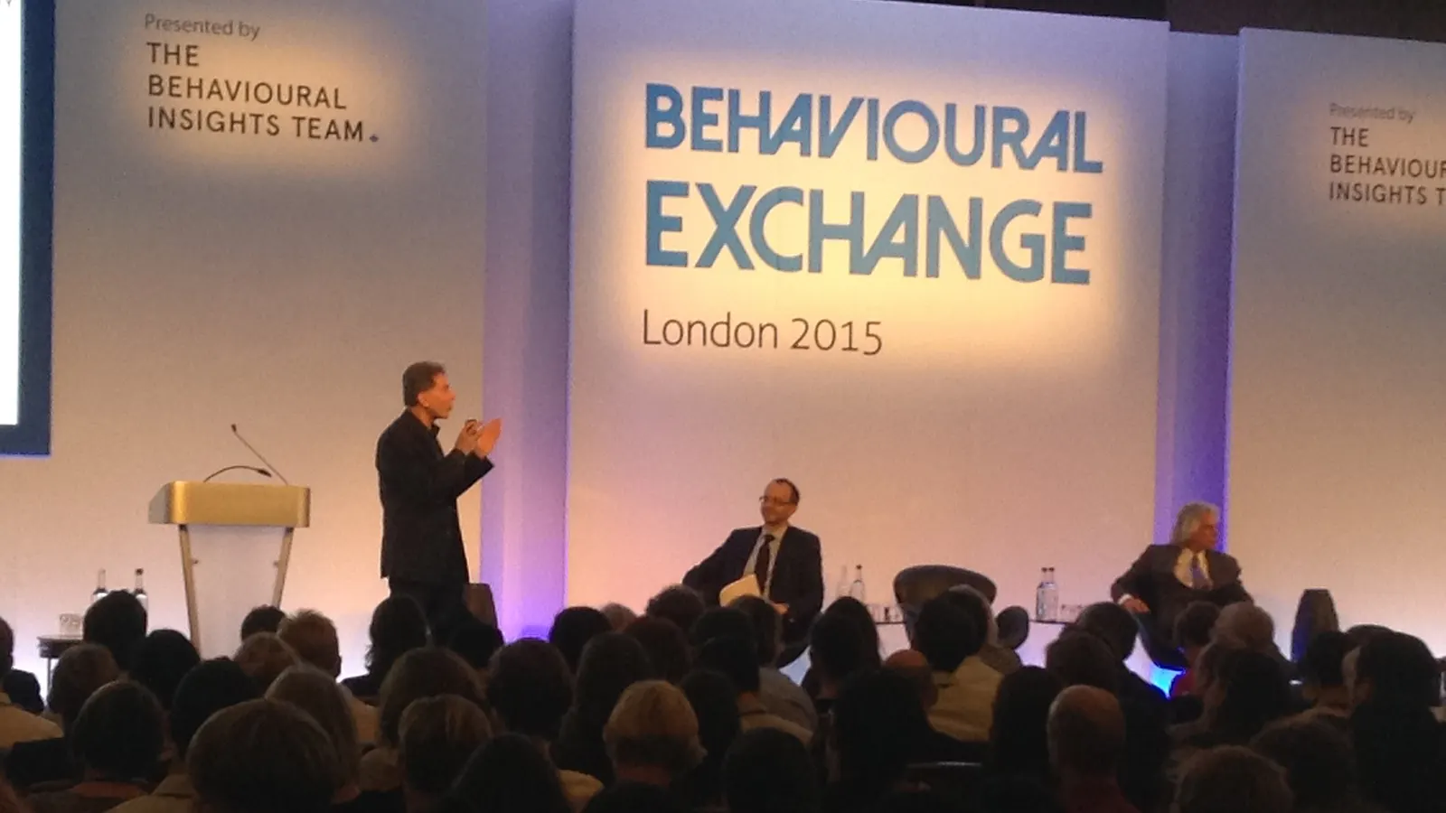 Dr. Robert Cialdini on stage at Behavioural Exchange London 2015, presented by the Behavioural Insights Team